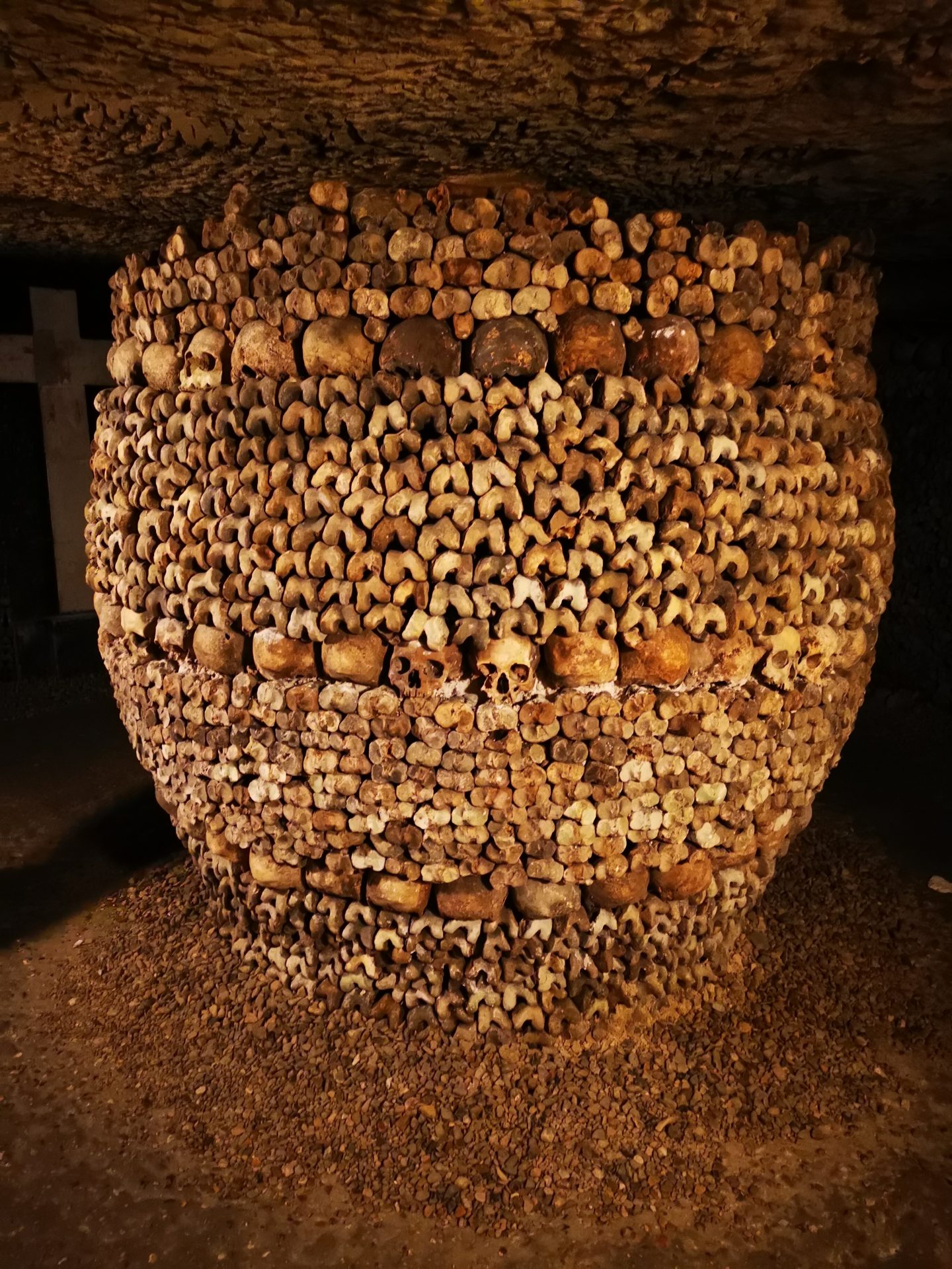 Catacombs Paris skull barrel