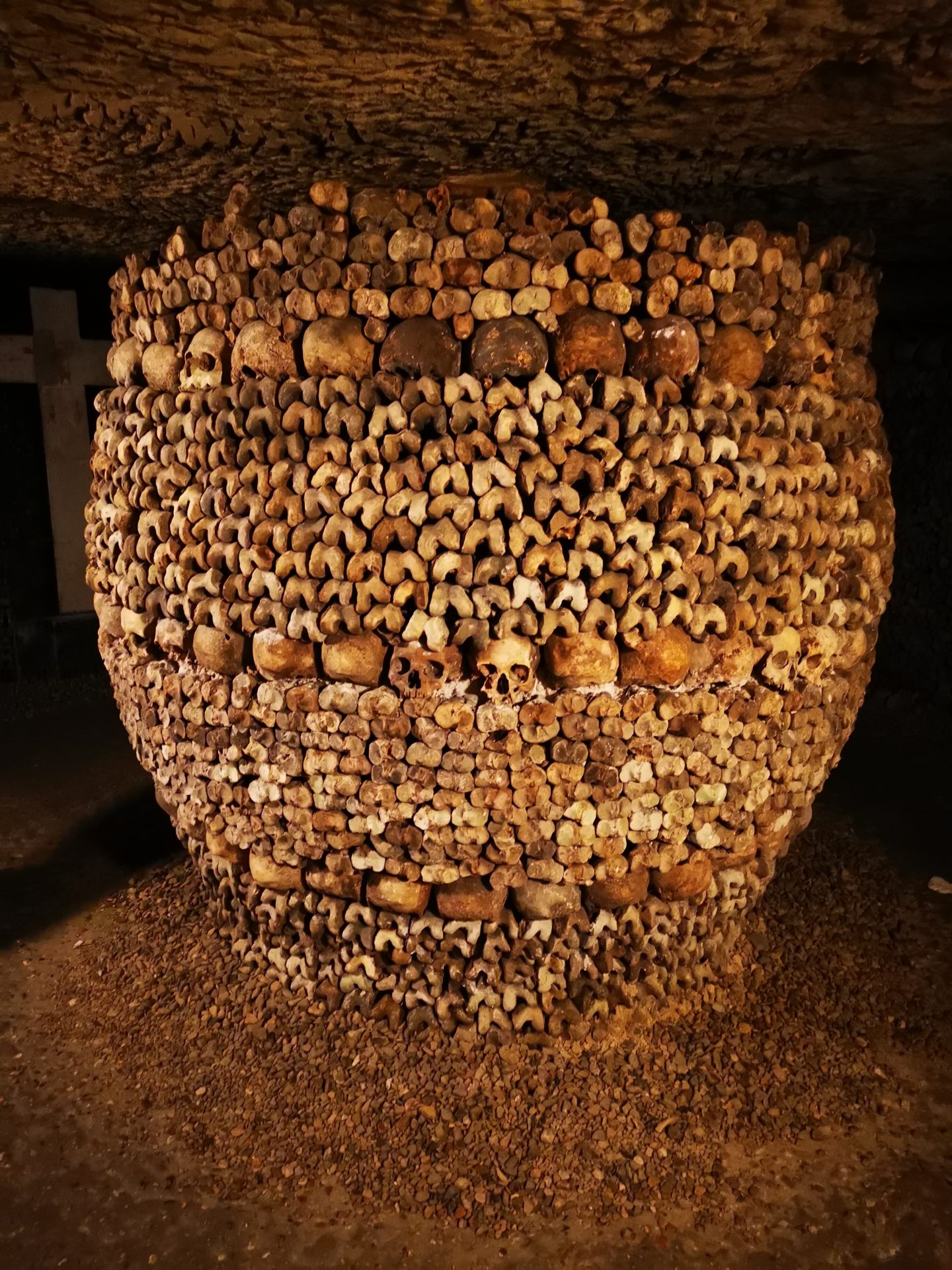 Catacombs Paris skull barrel